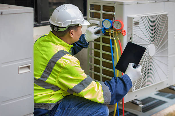 Professional Air Conditioning Repair technician working in Tulare, CA